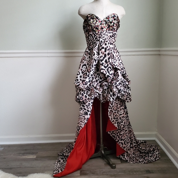 Jovani Dresses & Skirts - Jovani High Low Leopard with Red Lining 😱